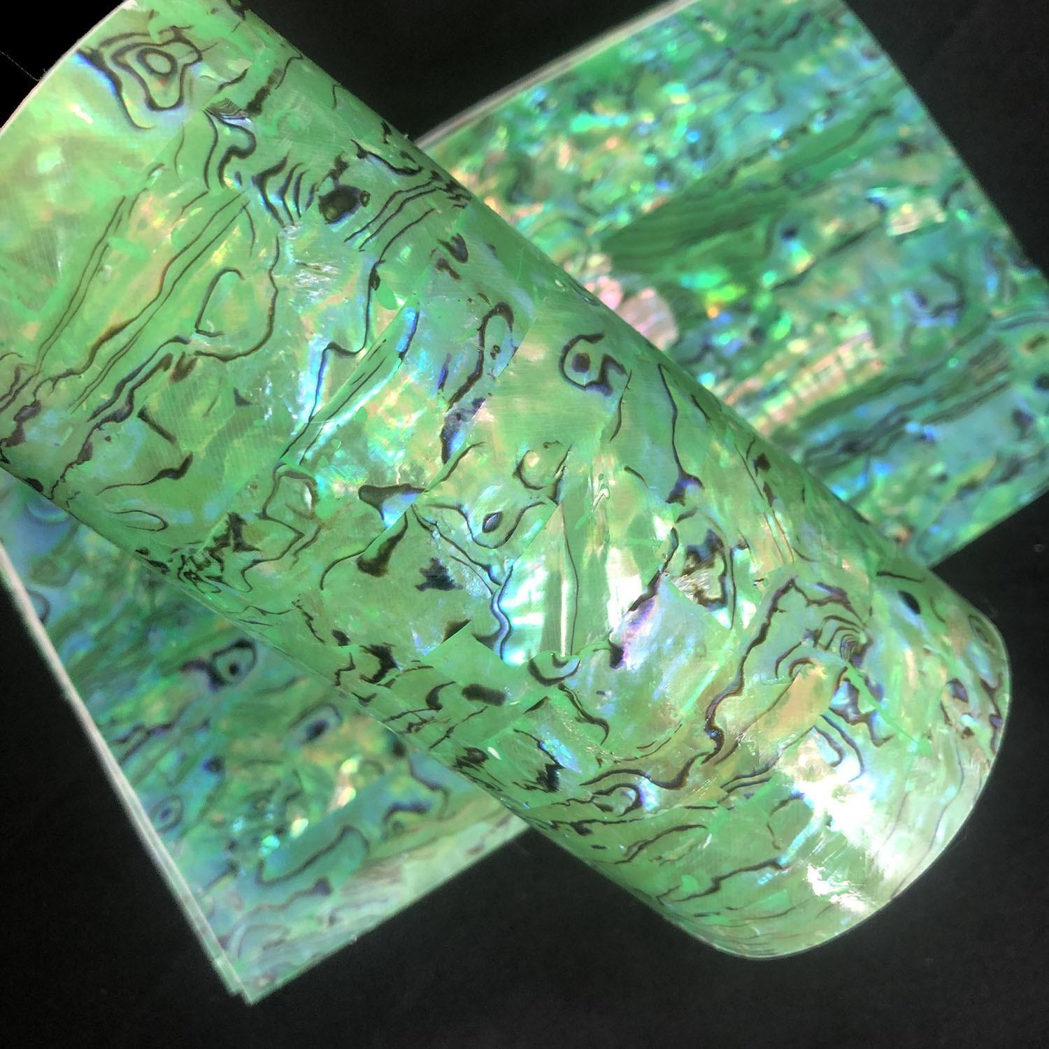 Natural flexible abalone with adhesive shell sheet