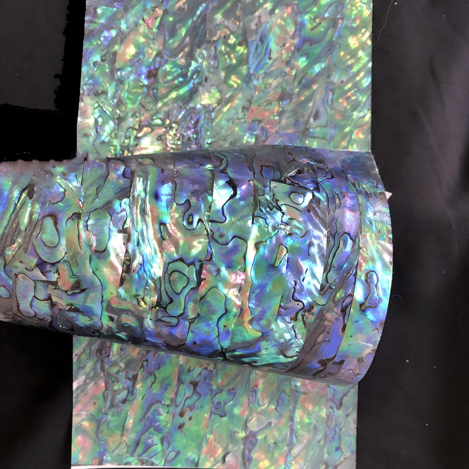 Natural flexible abalone with adhesive shell sheet